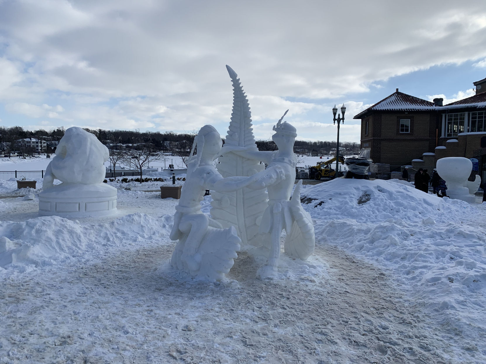 The "Tribal Dance" sculpture was one of several snowy pieces of art that was featured at Riviera Plaza